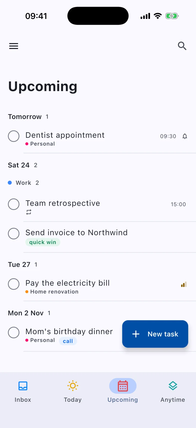 Upcoming on iPhone: tasks grouped by day.